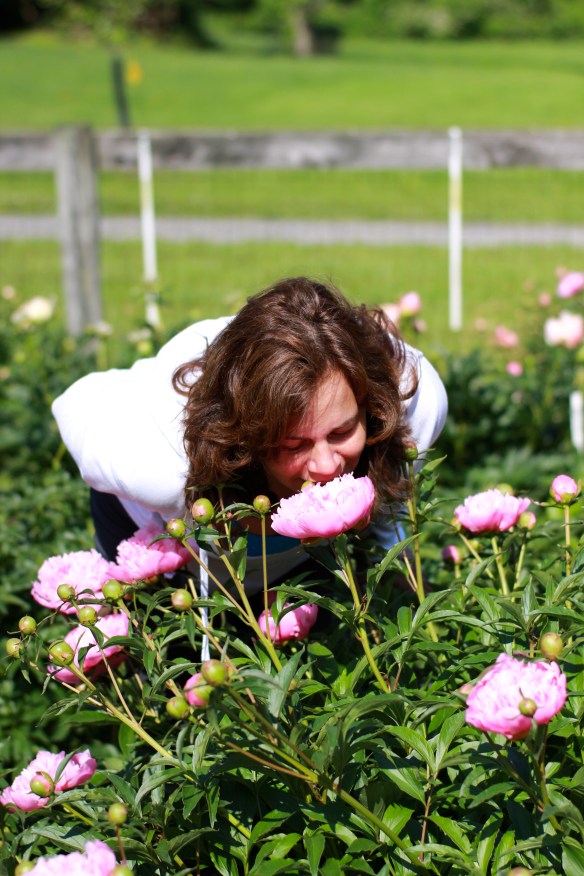 valerie smells the peonies
