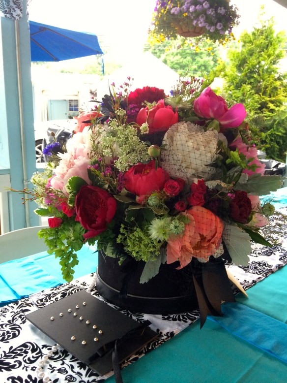 My design using peonies with a little hat netting 